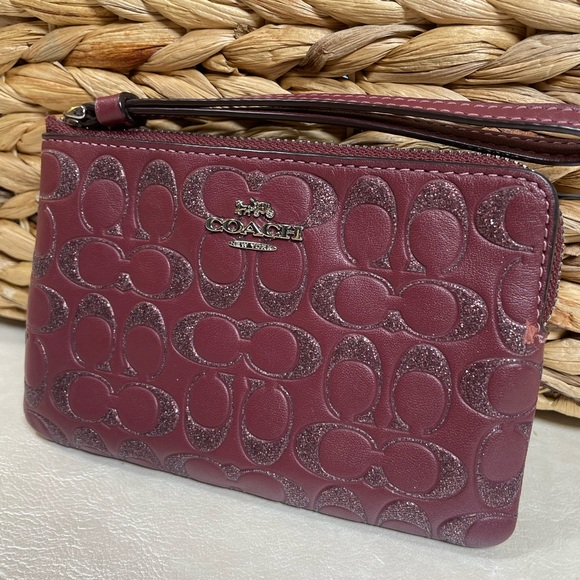 Coach Embossed Plum Wristlet - Picture 11 of 11